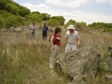 Nick Norman, consulting geologist, with visitors to Monastery.